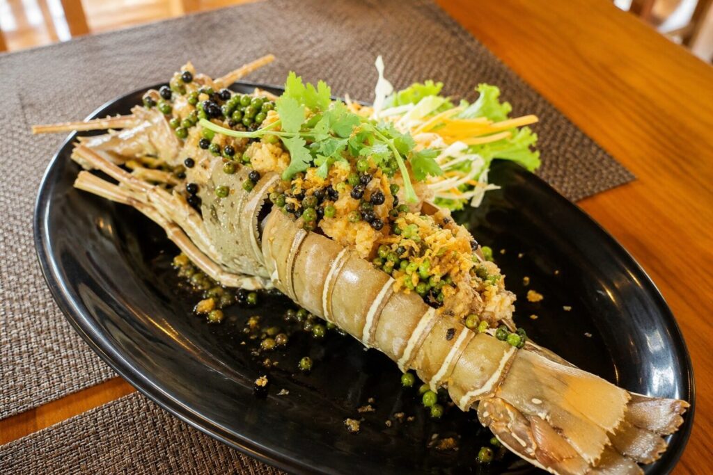 Garlic and black peppercorn lobster with crinkle-cut chips at Samui Cuisine, Chaweng