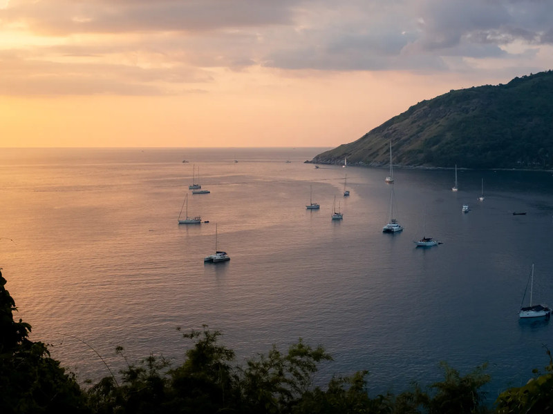 Phuket bay sailboats sunset